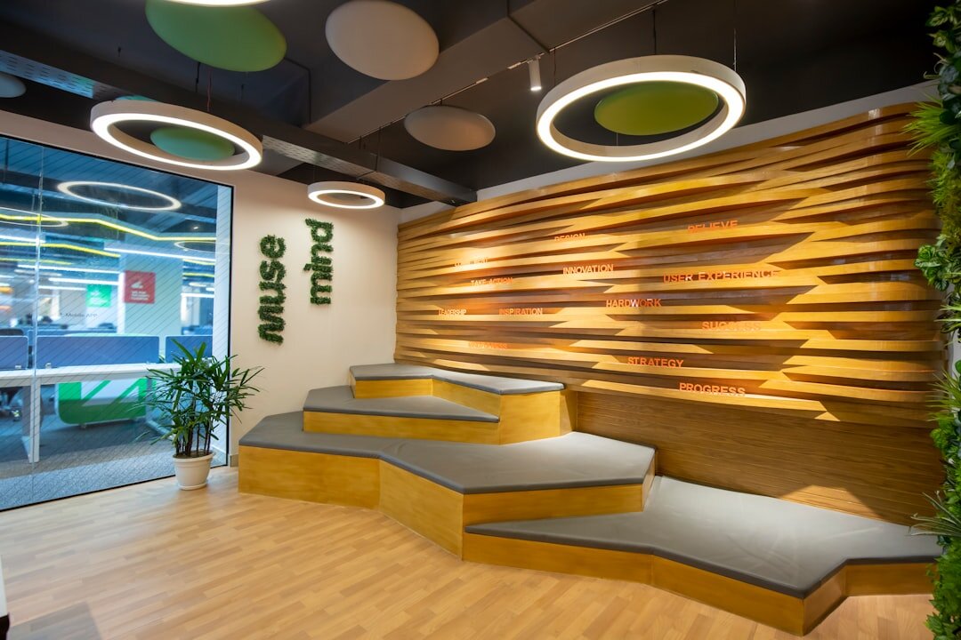 Modern studio reception and waiting area with warm lighting