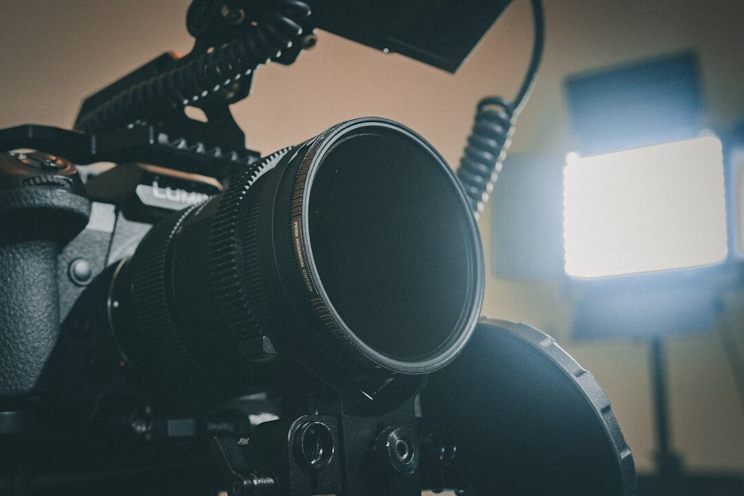 Close up of professional cinema camera and lighting gear